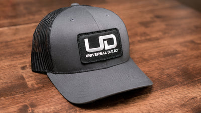 Universal Dialect Trucker Hat
